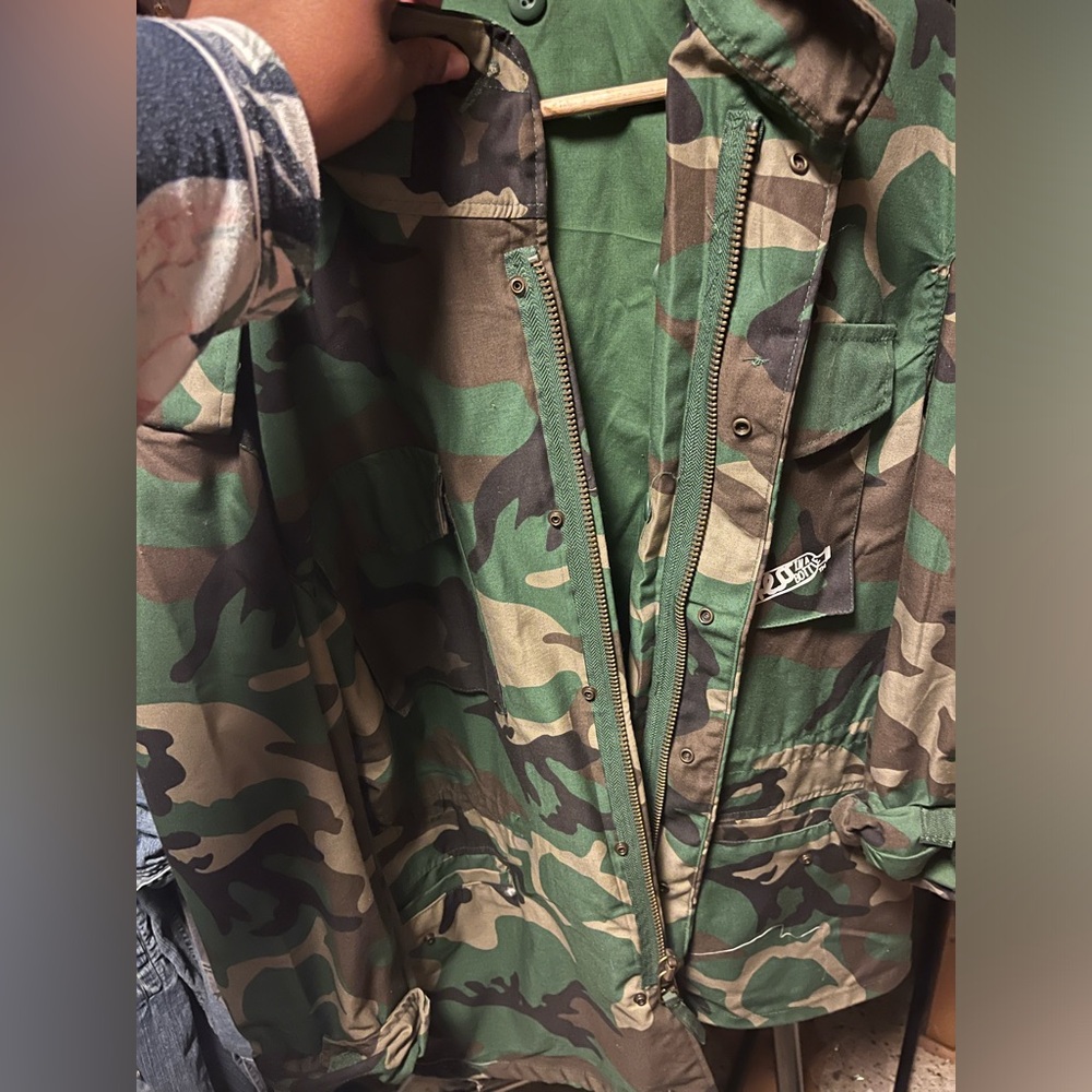 Camo jacket with message on back